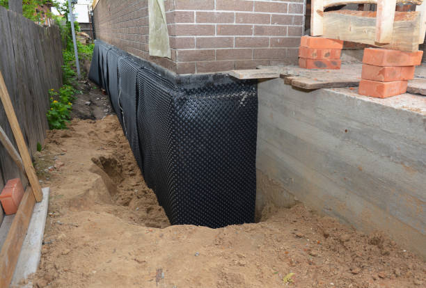 Happy homeowners after waterproofing job in Worthville